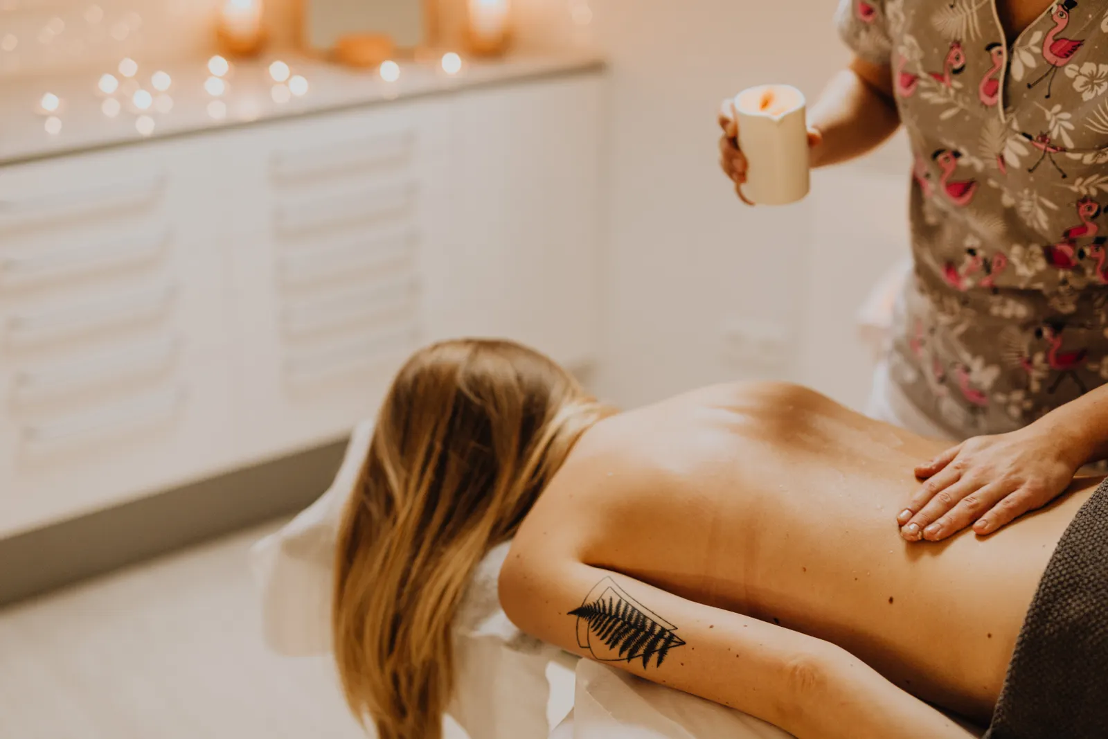 Soothing aromatherapy spa massage with essential oil applied to the back